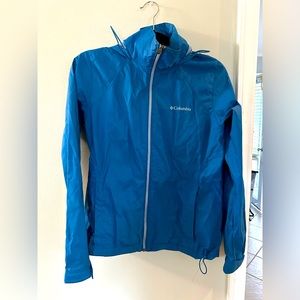 Small blue Columbia rain jacket. Like new.